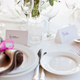 place settings for groom and bride at wedding reception